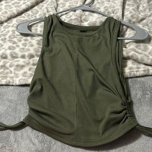 From SHEIN. Green crop top. Has stretchy thing on the side. Size S.